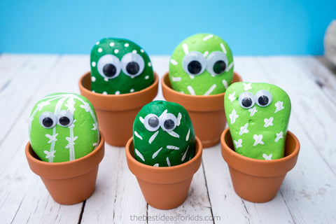 5 rock painted cactus in their little jar