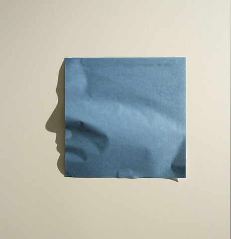 Kumi Yamashita construction paper projecting a shadow of a face