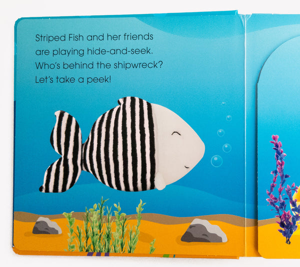 Black and white striped fish toy