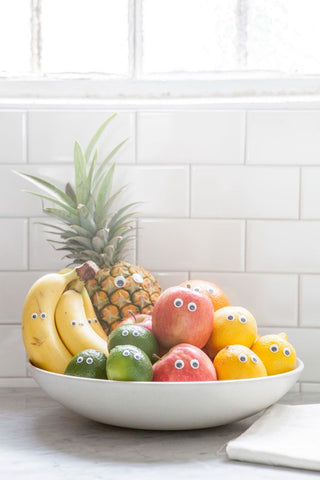googly eyes put on fruits and veggies for april fools
