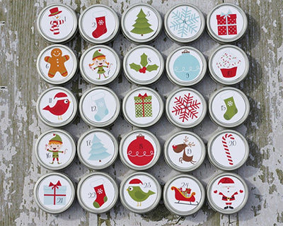 Tin can magnet advent calendar with Christmas images