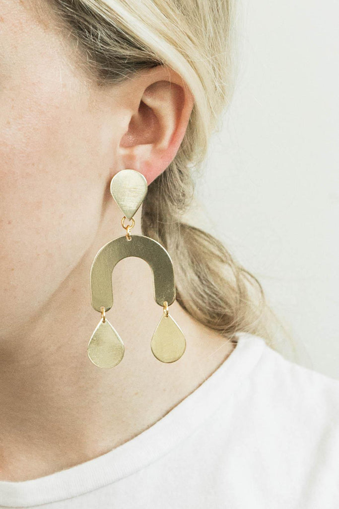 Model wearing M Street Studio statement earrings