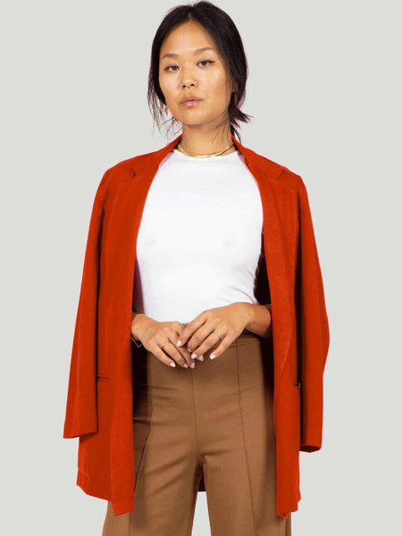 Model wears red Ripley Rader Ponte Knit Oversized Blazer with brown pants