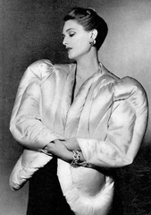 Model wearing white puffer jacket. Image from Harper’s Bazaar, October 1938.  Photography by Horst P. Horst