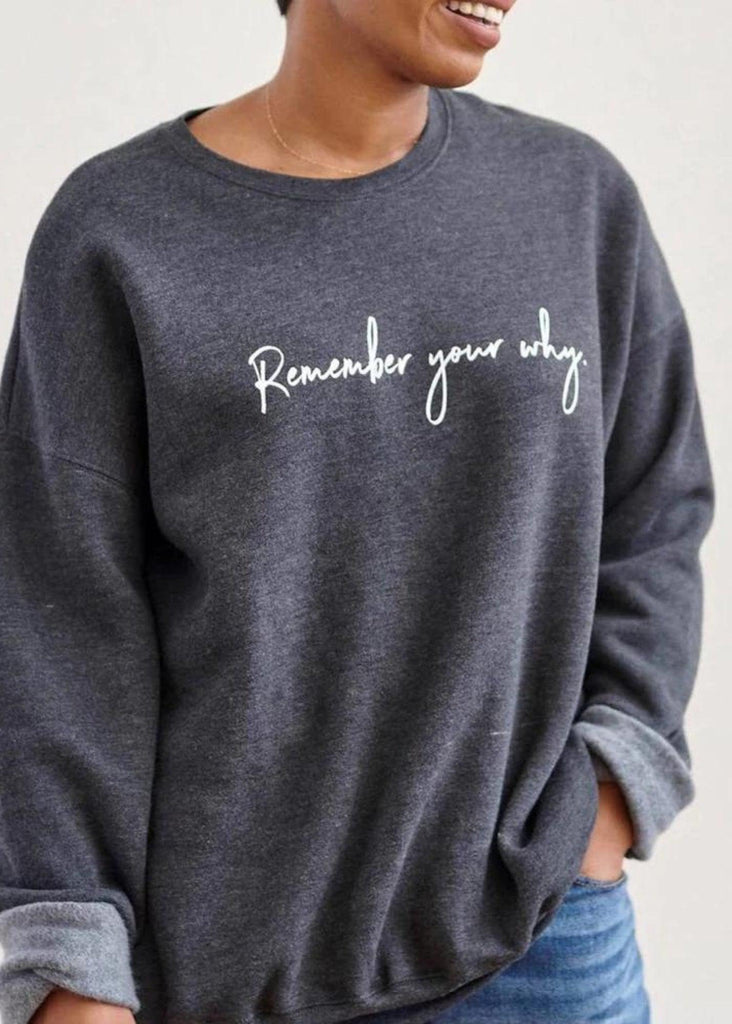 Model wearing gray Remember Your Why sweater from Know Purpose