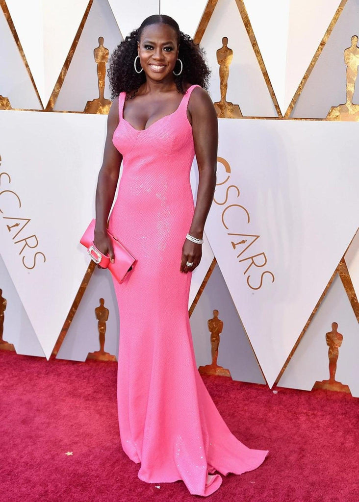 Viola Davis at 2018 Oscars wearing hot pink Michael Kors gown with diamond accessories