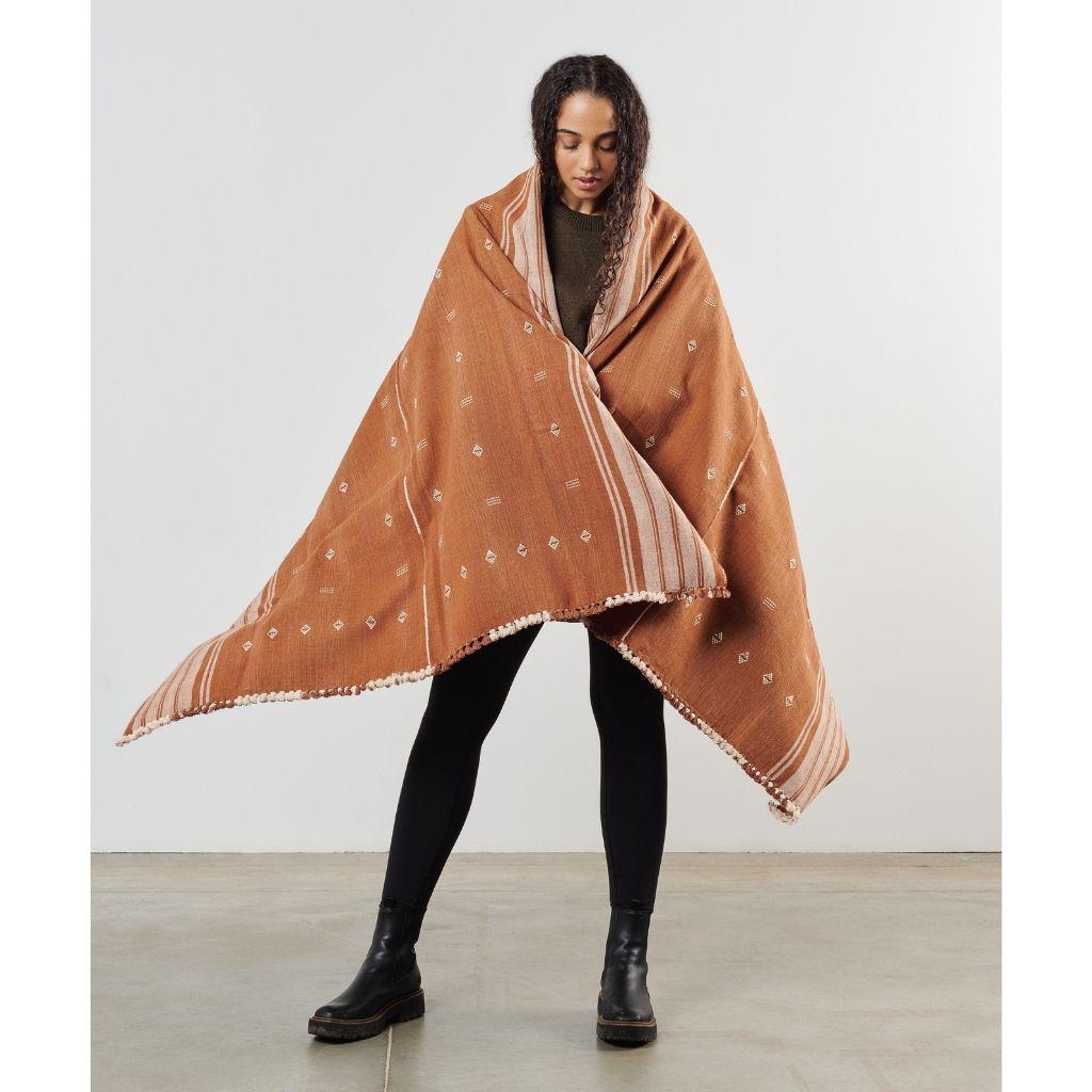Model wearing Studio Variously blanket