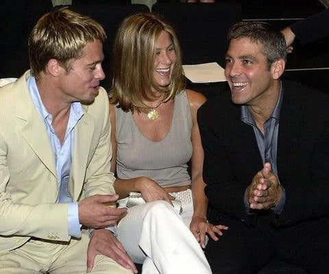 Jennifer Aniston wearing the Chan Luu pendant necklace at the Armani fashion show with Brad Pitt and George Clooney