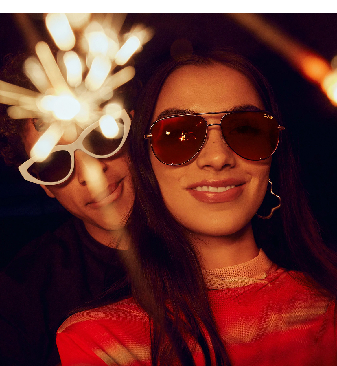 Two models wearing sunglasses