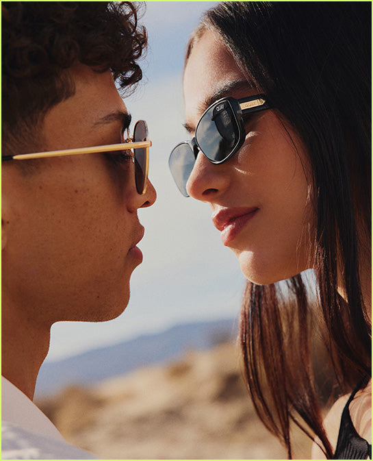 Two models wearing sunglasses