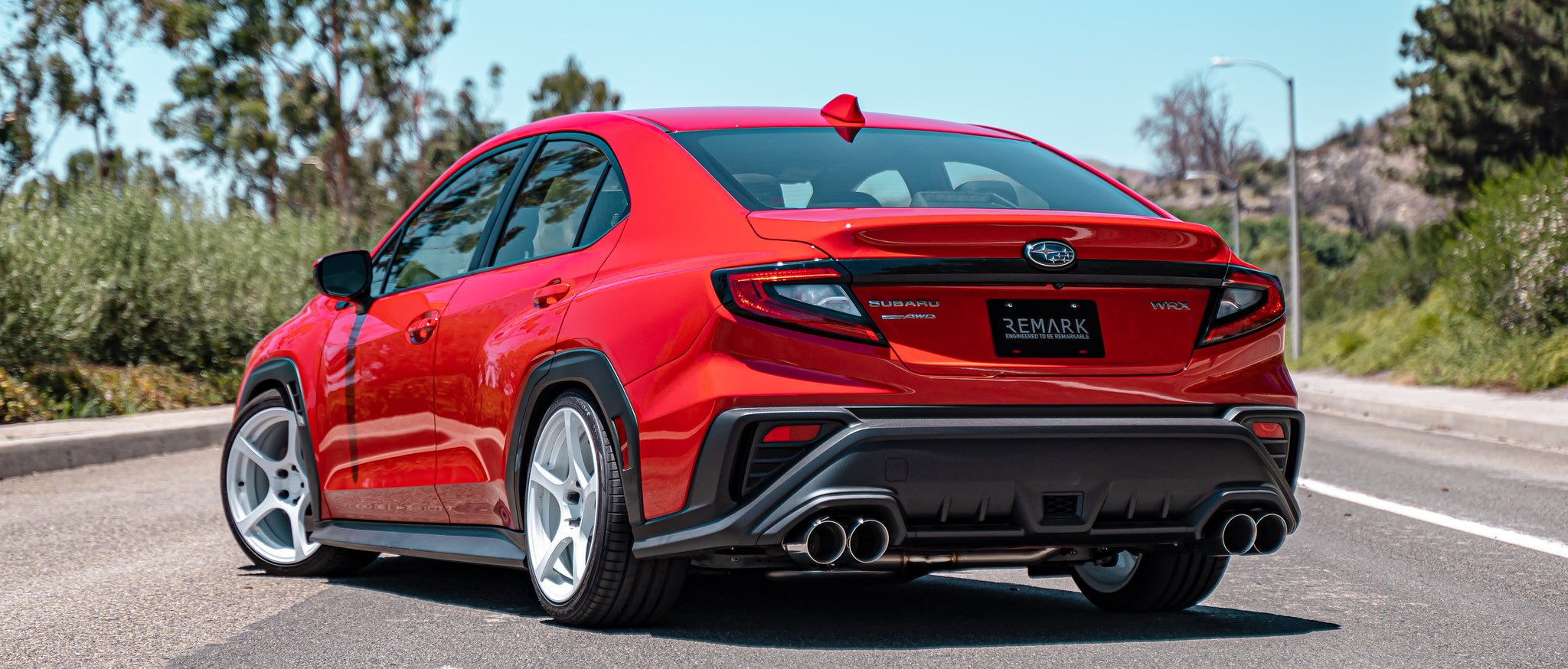 Rear 3/4 of Red 2022+ Subaru WRX with RO-TSVB-D4 installed