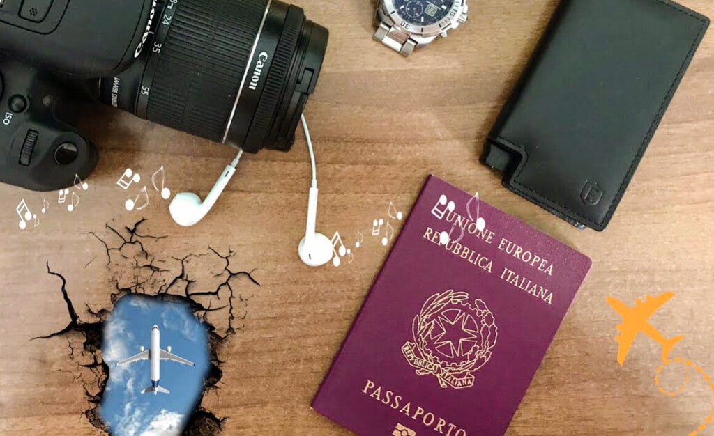 image of camera, earphones, passport and a handmade leather wallet