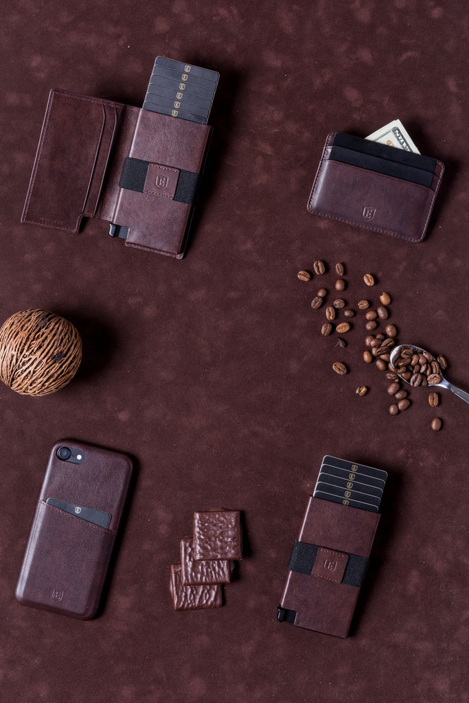 Card wallets on a table with coffee beans