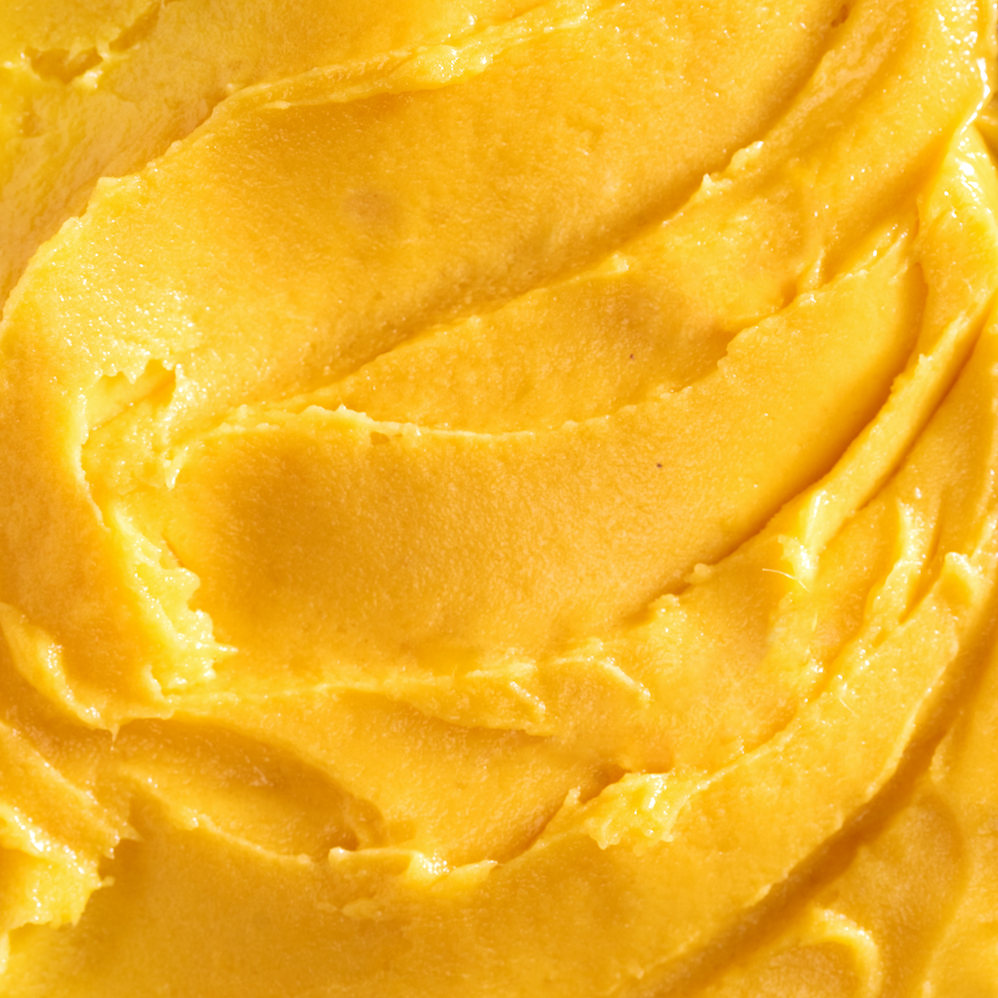 glace sorbet mangue avec mangue et cuillère