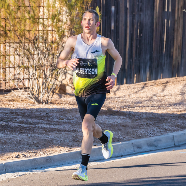 CJ Albertson running. Photo by @melissarusephoto