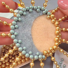 Sew pearls on to the moon - jewellery project