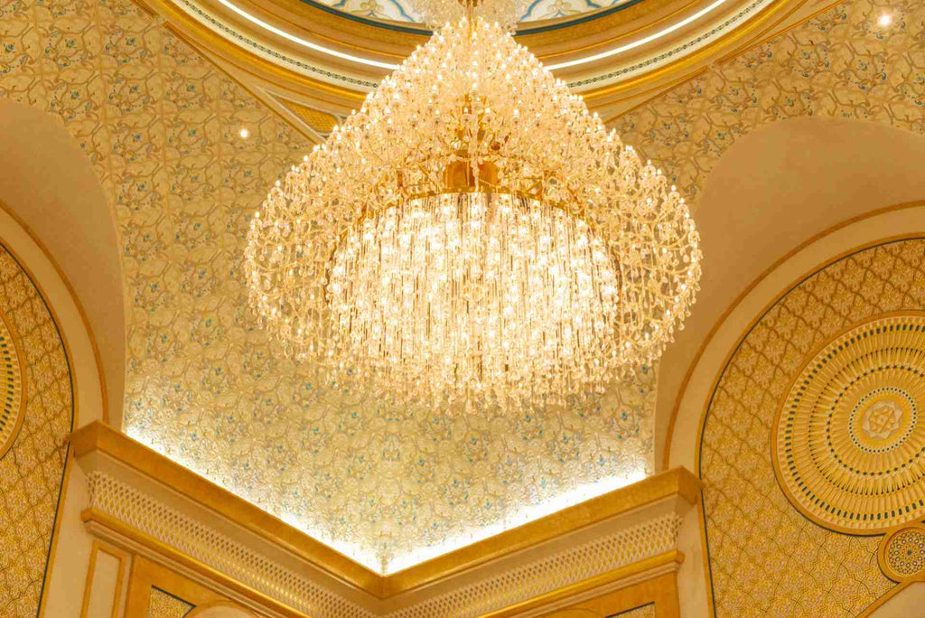 a lit chandelier with crystals