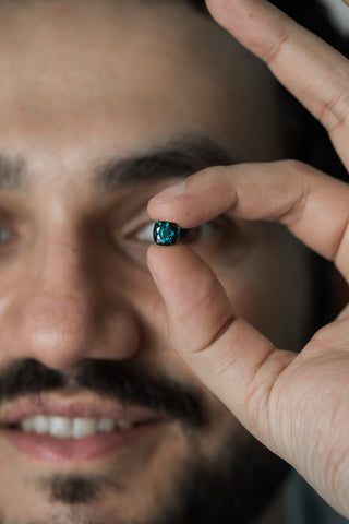 Here is Navneet in a very Nomad's like picture with one of his prized teal sapphires