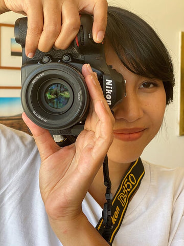 Nook Prangpak behind her camera
