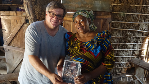 Robert Weldon, GIA director of the Richard T. Liddicoat Library and Information Center, pictured with an artisanal miner from Tunduru, Tanzania. Photo by Pedro Padua/GIA.