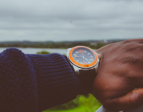 Man looking at watch