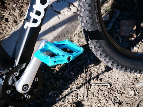 turquoise bike pedals