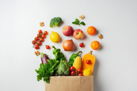 Paper bag with fruits and vegetables