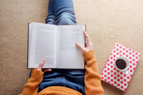 reading-concept-soft-focus-young-woman-relaxing-by-book-cozy-house