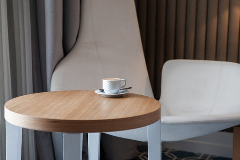 side-view-cup-coffee-small-round-table-horizontal