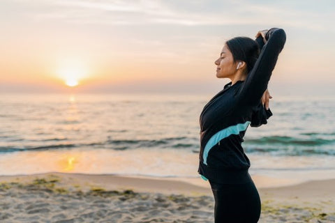 relaxed-girl-sunset-background