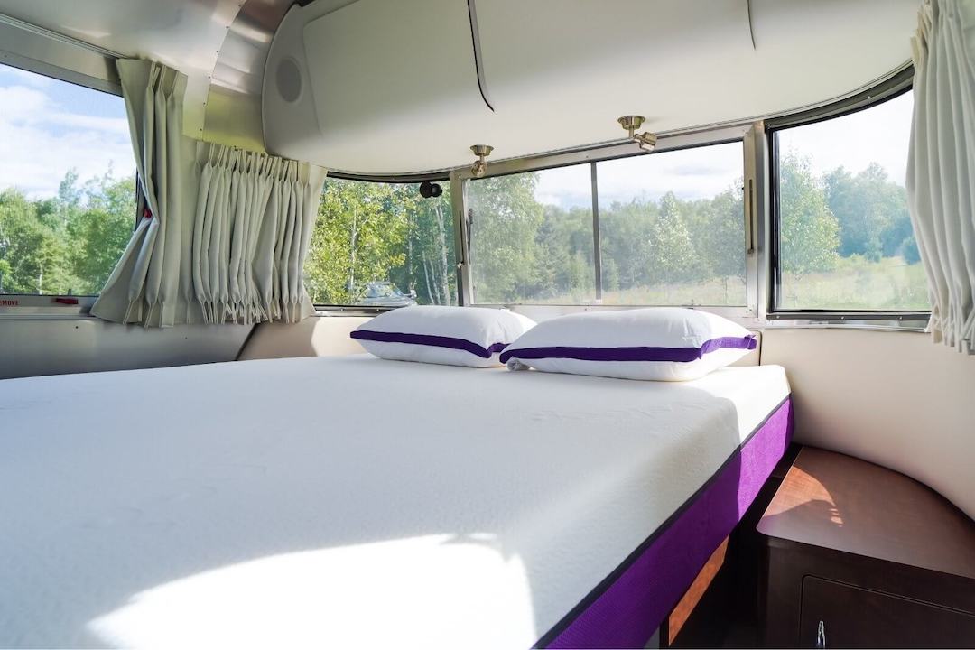 Front 3/4 view of the Polysleep VR mattress in the bedroom of a trailer