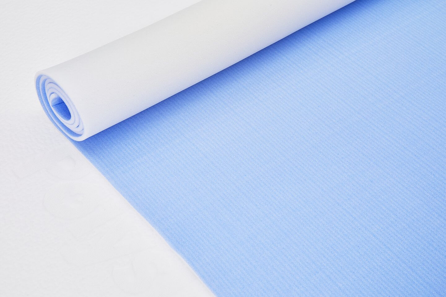 Close-up of the semi-folded PolyCool thermoregulating mattress topper