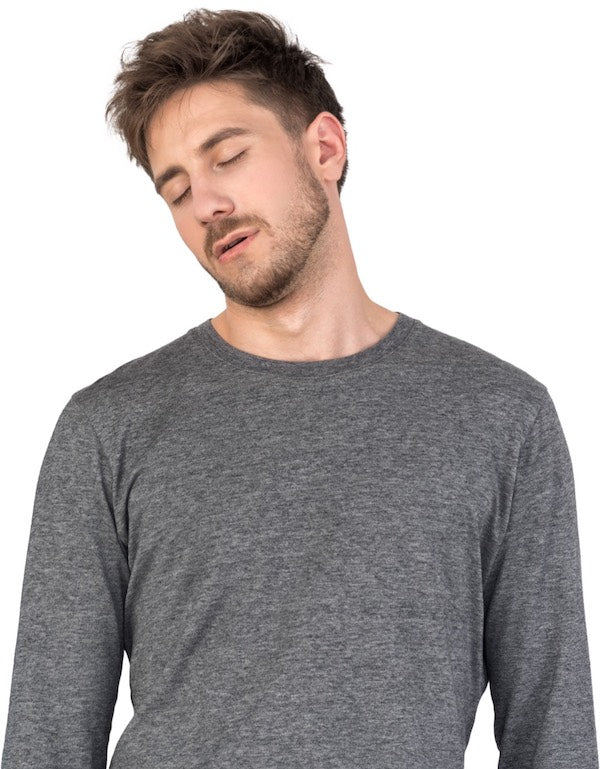 Man standing with eyes closed signifying sleepwalking