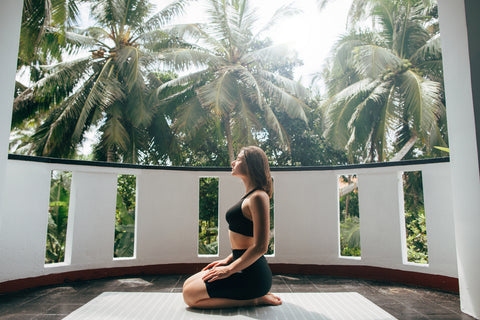 kneeling down and sit on heels adamant gentle pose for constipation relief and strengthening digestive organs