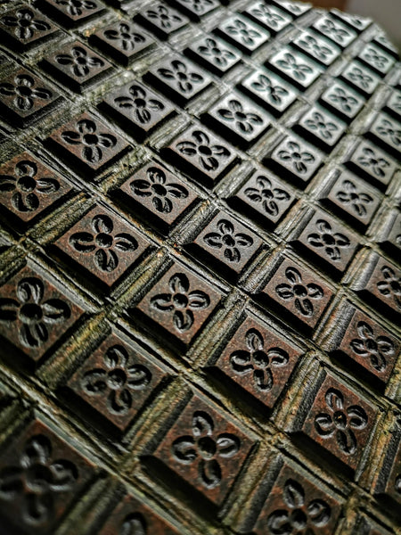 detail of a repeat pattern carved into a lino block