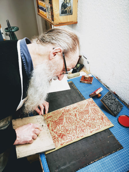 John Jeffery block printing a simple pigeon print