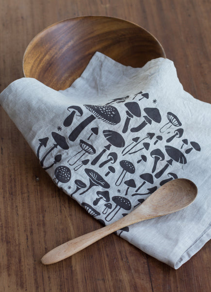 Hand-printed linen tea towel with mushroom pattern design