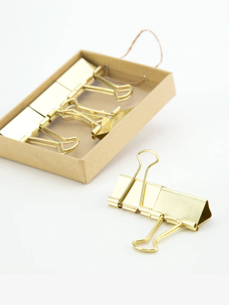 large gold binder clips