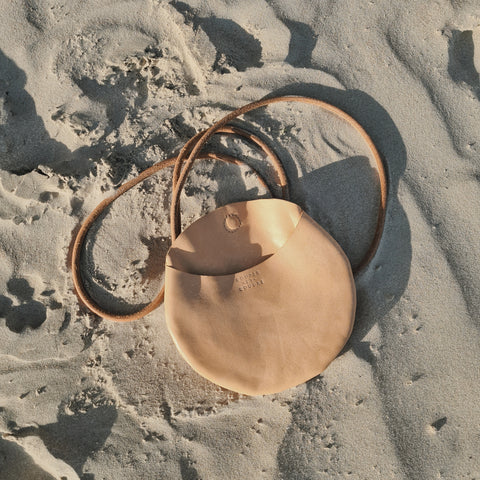 Arlo in sand on the beach