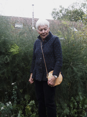 Patsy in her allotment with the Arc bag in Caramel