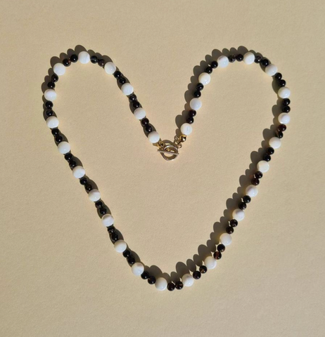 beaded necklace in the shape of heart