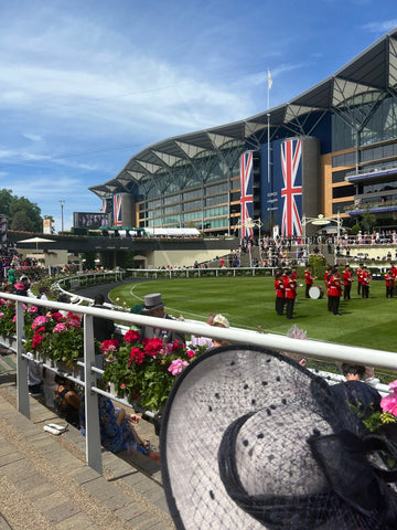 Royal Ascot Parade Ring with brimmed hat in foreground