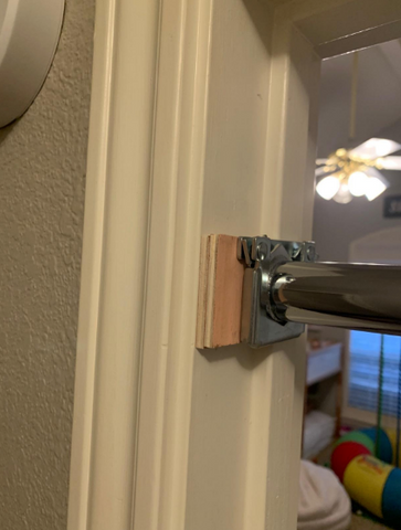 Adjusted doorway bar brackets for smaller door frames