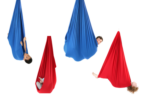 These are some examples of different ways of relaxing in the sensory swing. One of the models is reading a book while the other three are laying in it in different positions.