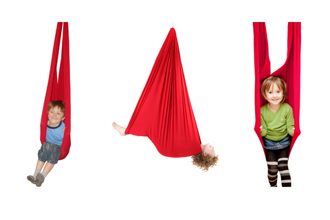 A few examples of different ways to swing in the sensory swing. Two of them sitting and one laying down