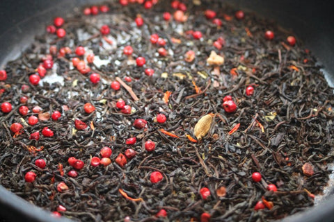 tea and peppercorns in a pan