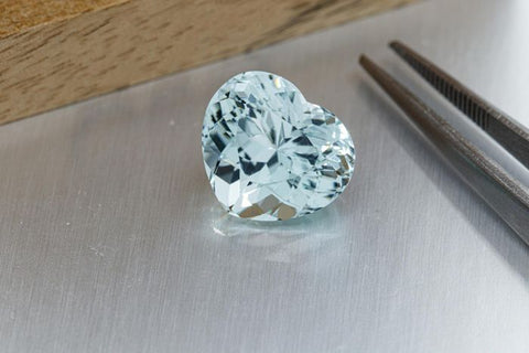 Lap created gemstones on black table
