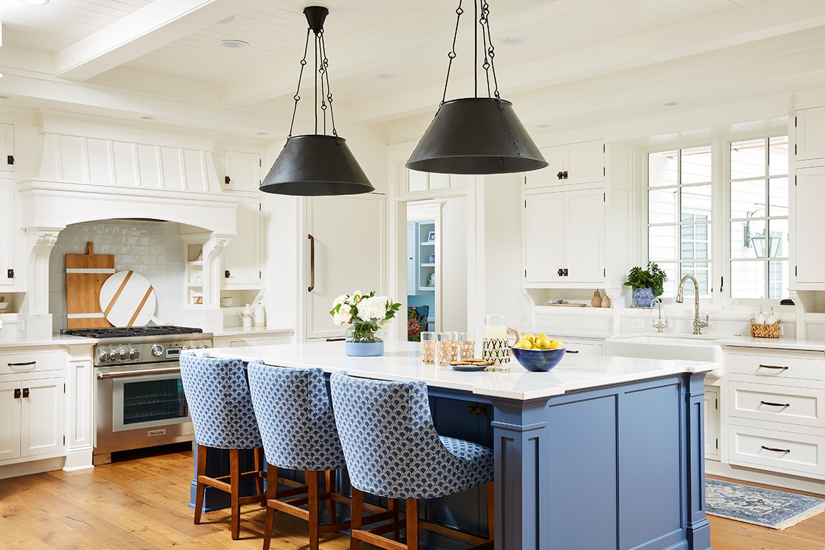 kitchen with blue island and dark fixtures