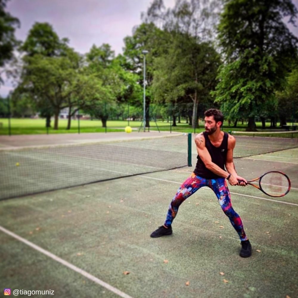 Playing tennis in disarray mens leggings