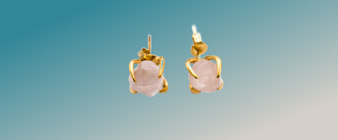 small post earrings with rose quartz stone in a prong setting